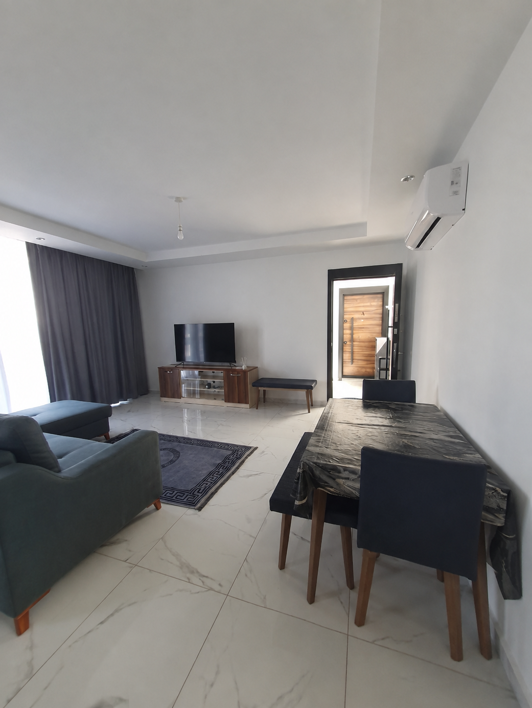 İskele Boğaz Four Seasons Life 1’de Full Eşyalı Satılık 2+1 Daire görsel 2