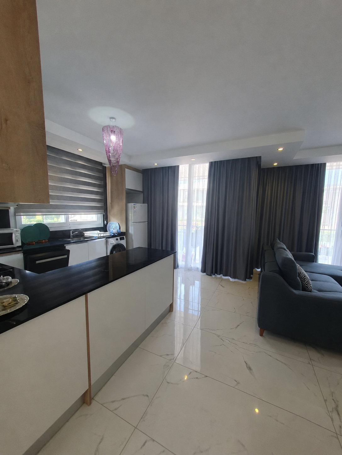 İskele Boğaz Four Seasons Life 1’de Full Eşyalı Satılık 2+1 Daire görsel 3